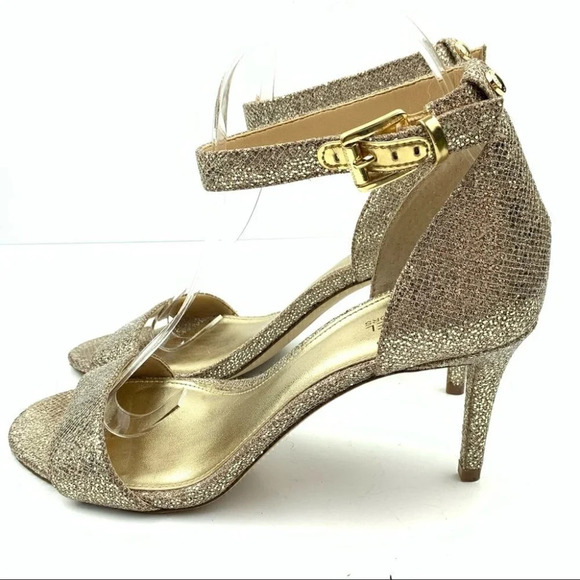 KORS MICHAEL KORS Gold Heels - 7M US – LuxAnthropy Michael Michael Kors heels size 7.5 38 gold snakeskin print glitter stilettos